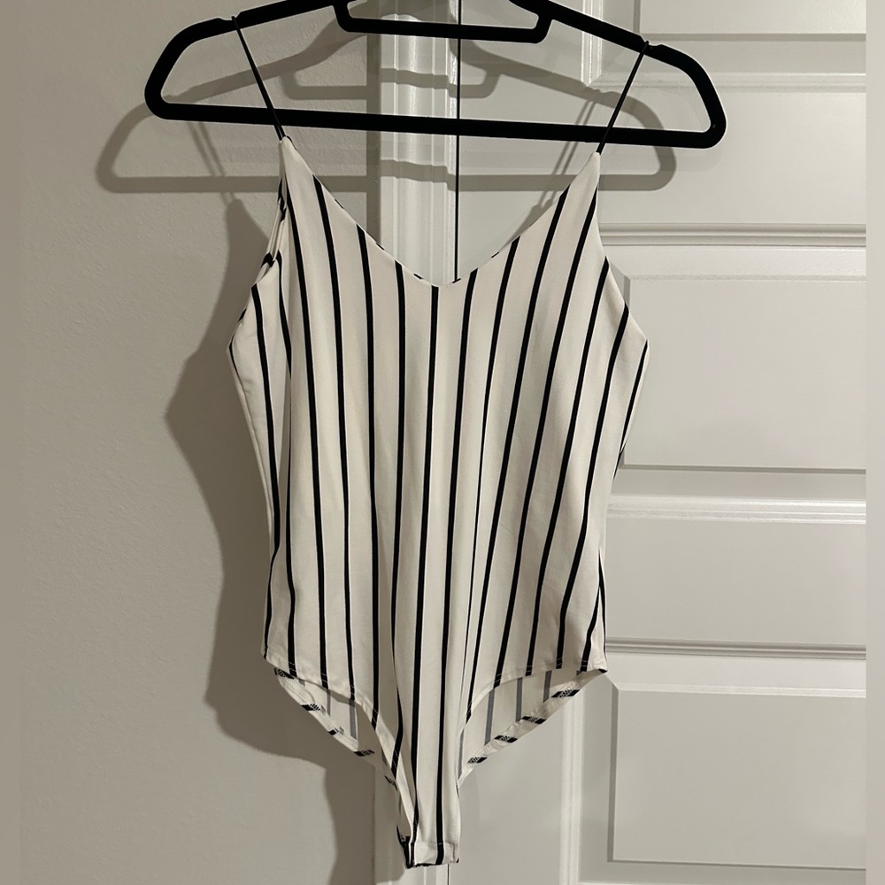 Striped white and black bodysuit